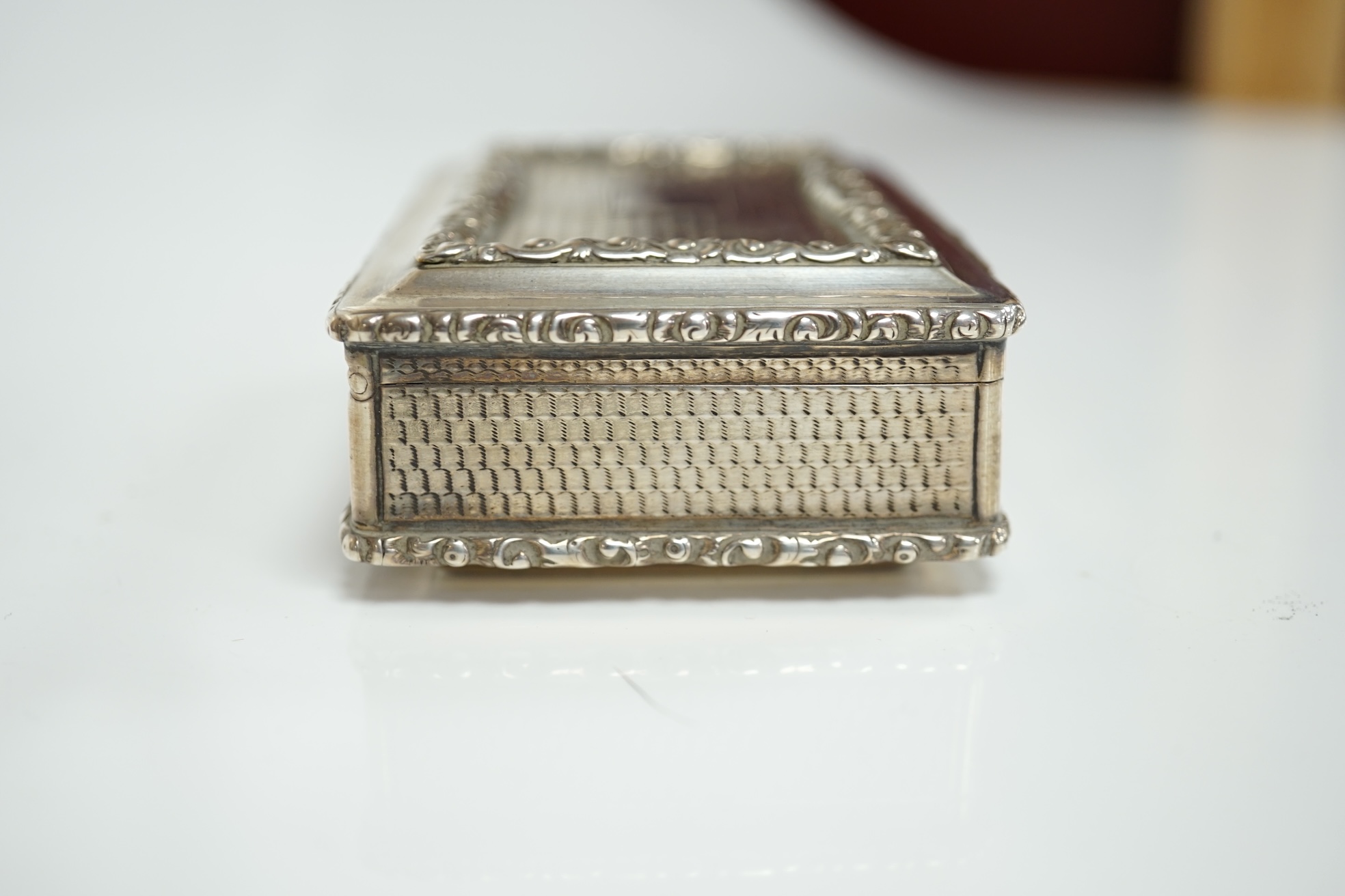 A George IV silver rectangular table snuff box, by Edward Stammers, Birmingham, 1827, 86mm, weight 159 grams. Condition - good.